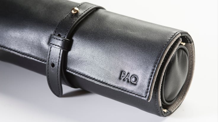 Rogue Paq ritual cases- black lambskin leather/silver suede and all-black vegan leather/suede.