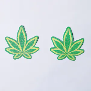 Photo of Green Cannabis Leaf with Yellow Outline