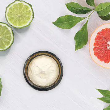 Photo of G L O W • BERGAMOT GRAPEFRUIT BODY BUTTER