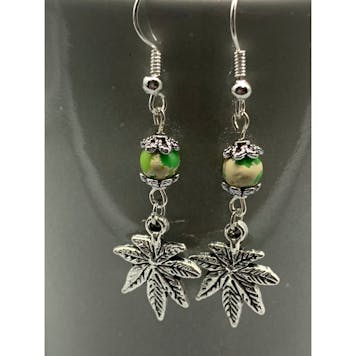 Photo of Handmade Cannabis Leaf Earrings.