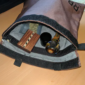 Photo of Deluxe Rumble Box Odor Eliminator Smell-Proof Bag for Herb and Accessories – With Side Swivel Dugout