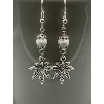 Photo of Handmade Cannabis Leaf Earrings.
