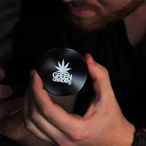 Photo of 2.5" 4 Piece Aluminum Herb / Weed Grinder - By GreenGrinders Carrying Pouch & Kief Scraper Included