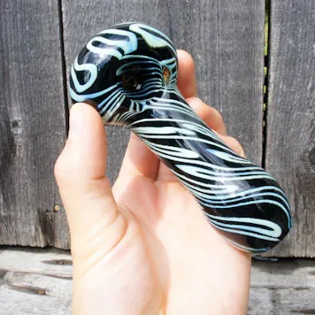 Photo of 4" Inside-out Slime Cane And Black Frit Glass Pipe