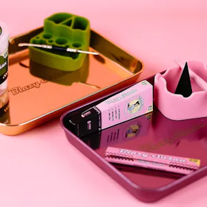 Photo of Blazy Susan Stainless Steel Rolling Tray - Purple or Rose Gold